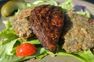 Sunflower seed burgers with grilled balsamic portabello mushrooms and a green salad