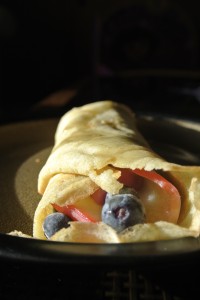 We filled these beautiful crepes with blueberries, steamed apple slices, roasted sunflower seeds, blueberry coconut yogurt, and topped it with maple syrup.